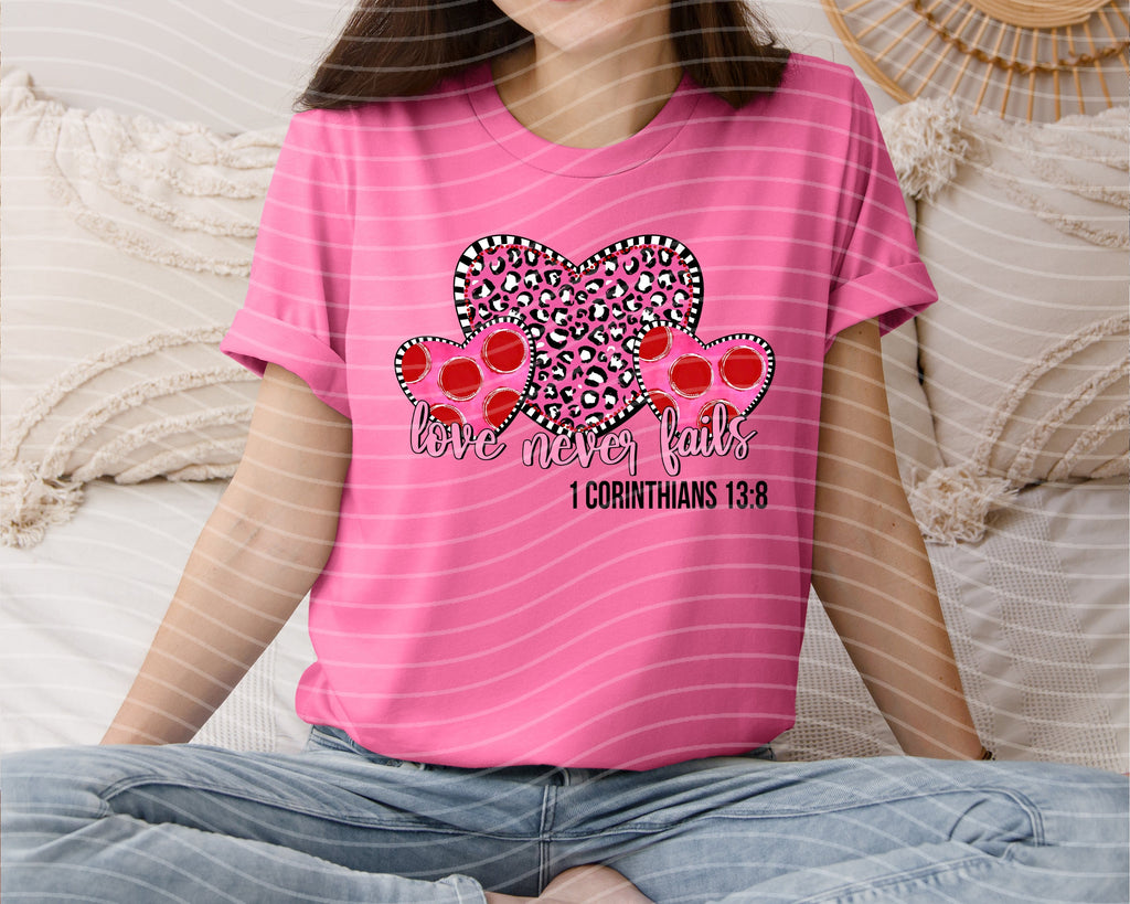 Love Never Fails Graphic Tee product image 1